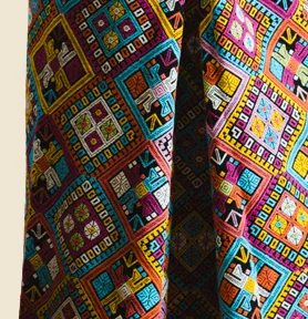 Close-up of a handwoven, patterned Thai silk skirt
